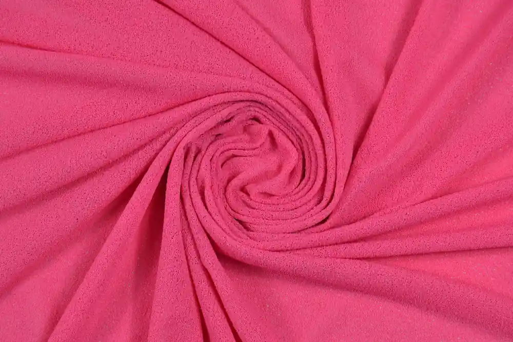 Grande successo | Maglina crêpe bi-stretch semi-trasparente fucsia