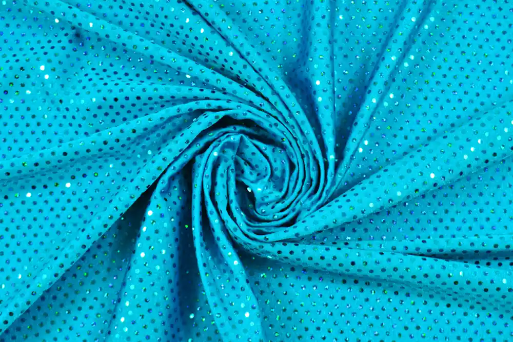 Risparmio extra - Scampolo 300x155cm di Lycra turchese con paillettes 330g